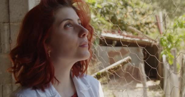 Young Female Agronomist Working Summer Garden Redhead Woman Checking Plants — Stock Video