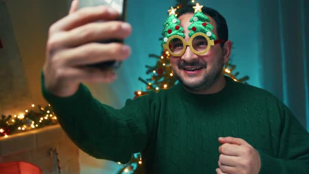 Man Enjoy Christmas in the house with tree. Man Enjoy Christmas in the house with tree.