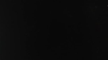 Parlayan Soyut Portakal Arkaplanı Siyah Üzerine Gerçek Mercek Fişeği Efekti.