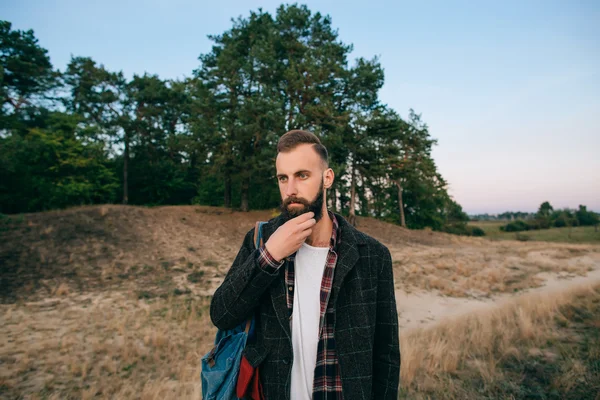 Hipster gypsy man in the forest — Stock Photo, Image