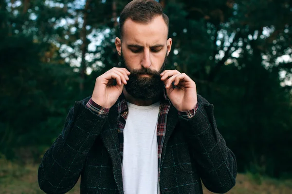Hipster gypsy man in the forest — Stock Photo, Image