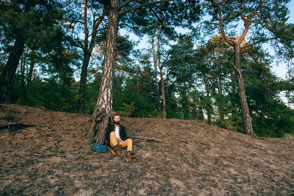 Hipster gypsy man in the forest — Stock Photo, Image