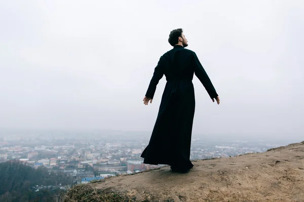 Portrait of handsome catholic bearded priest — Stock Photo, Image