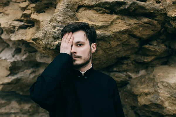 Portrait of handsome catholic bearded priest — Stock Photo, Image