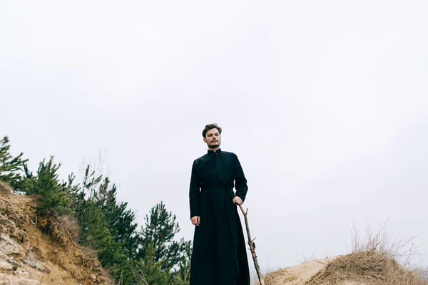 Portrait of handsome catholic bearded priest — Stock Photo, Image