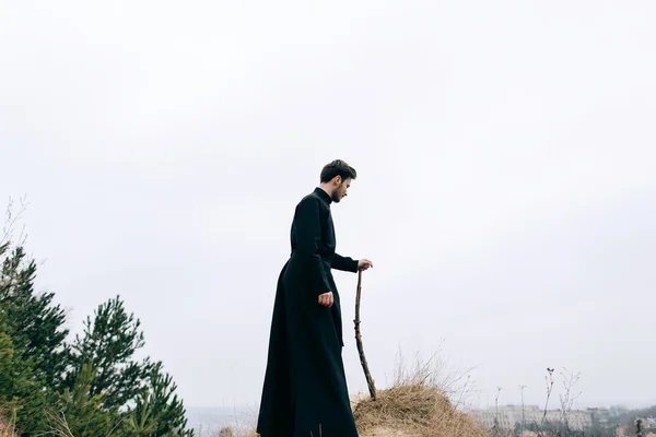 Portrait of handsome catholic bearded priest — Stock Photo, Image