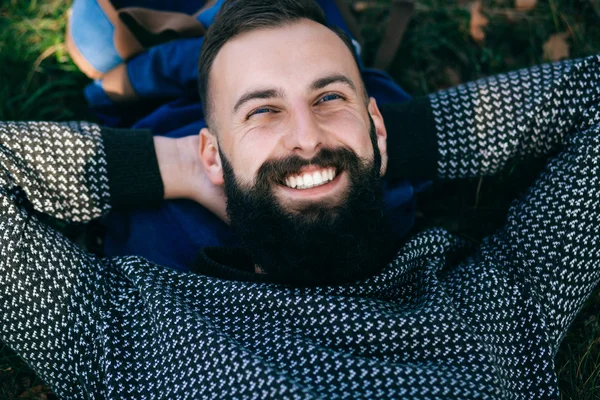 Bearded Man lying on the grass — Stock Photo, Image