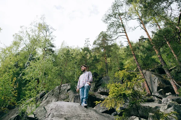 Lonely man in forest — Stock Photo, Image
