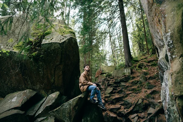 Lonely man near mountain river — Stock Photo, Image