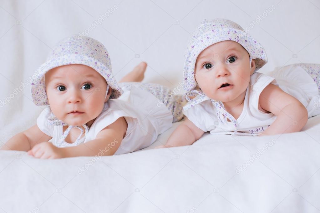 Funny twins sisters babies
