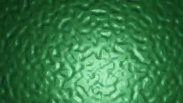 Dunkelgrüne organische Textur mit unregelmäßig geprägten Blobs, die in Lichtblitzen rotieren. Abstrakter Videohintergrund. Computergenerierte Animation