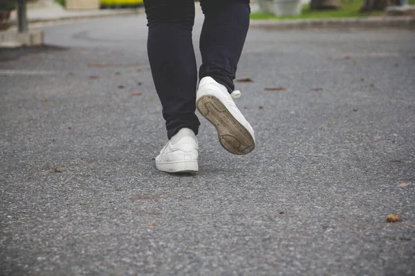Woman Jeans Sneaker Shoes Walking Road — Stock Photo, Image
