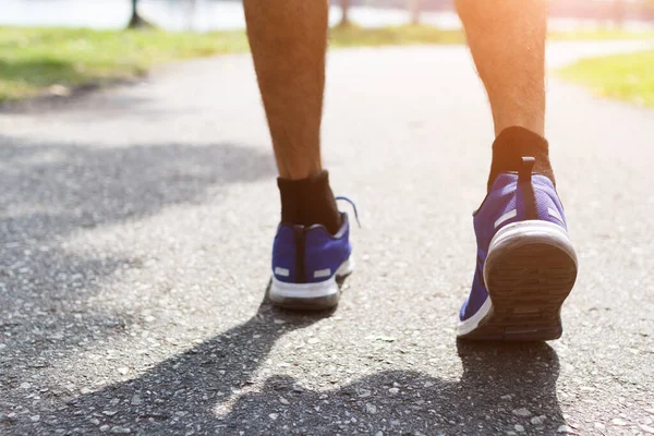 closeup of male running walking shoes. Work out concept, step walk