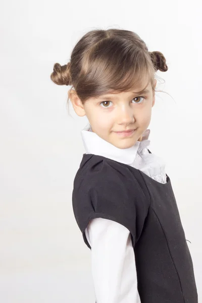 小女孩，女学生，两个马尾辫，校裙，白衬衫 — 图库照片