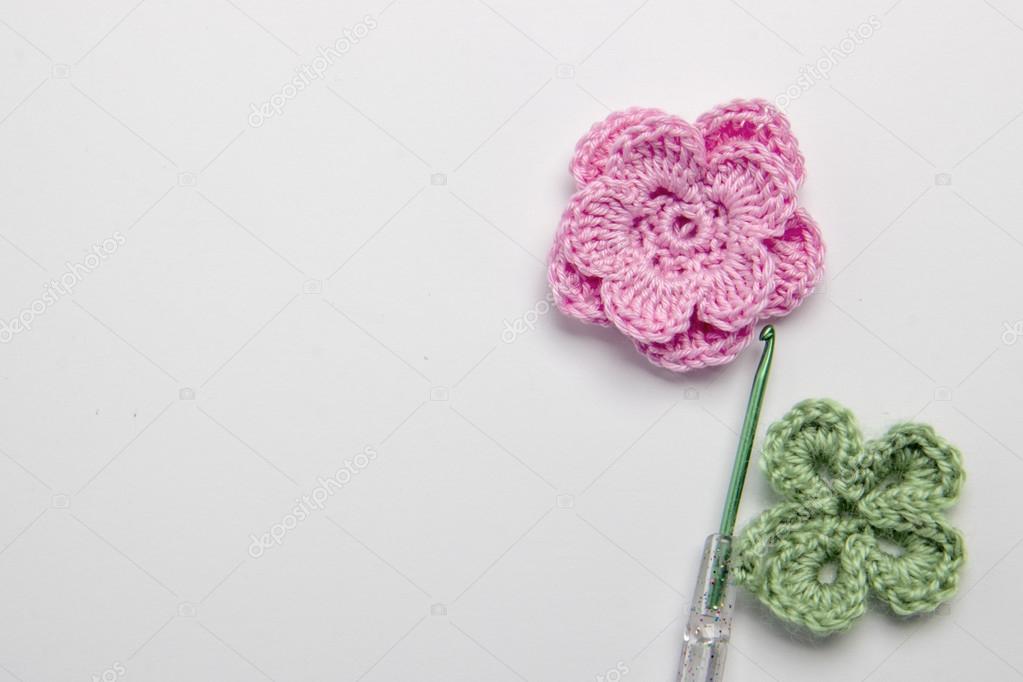 flower and clover leaf made of yarn