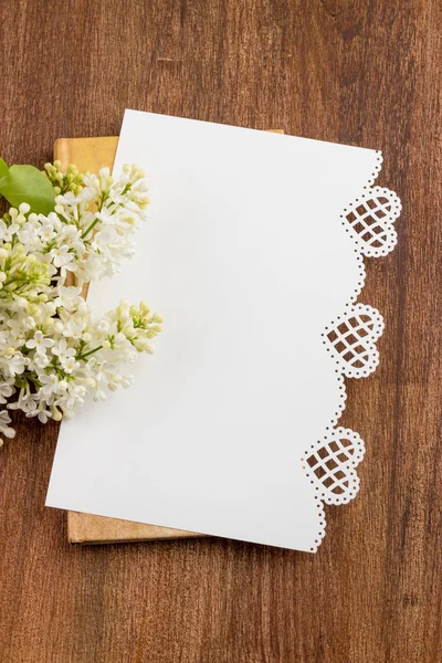 white lilac, lilac purple, white sheet of paper with hearts punc