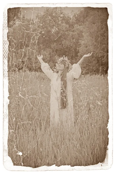 Young girl in the Ukrainian embroidered shirt, with a wreath of — Stock fotografie