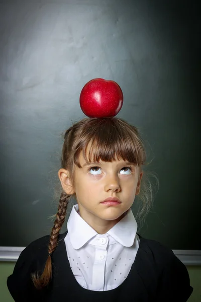 Escuela, niña, colegiala 6 años en un vestido negro y una sh blanco —  Fotos de Stock