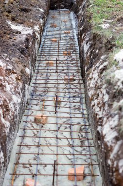 building foundations, reinforcement, concrete rubble, wooden for