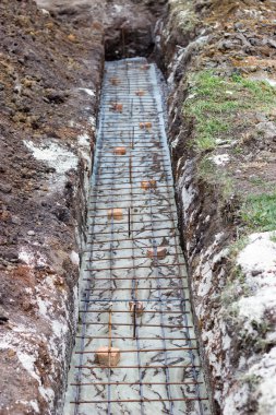 building foundations, reinforcement, concrete rubble, wooden for