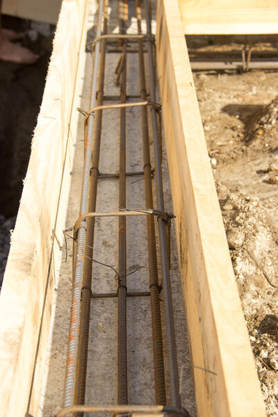 building foundations, reinforcement, concrete rubble, wooden for