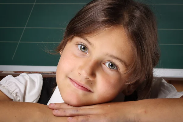 Girl schoolgirl in a black school uniform, a white shirt with tw — Stock Photo, Image