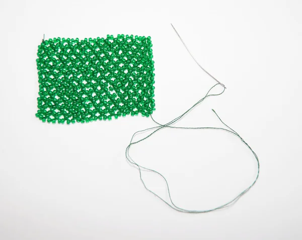 Woven beaded mesh and needle_5 — Stock Photo, Image