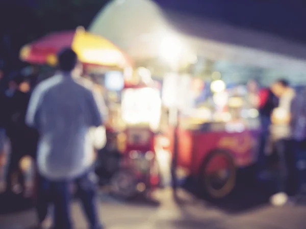 Food store market Event outdoor Blurred people background