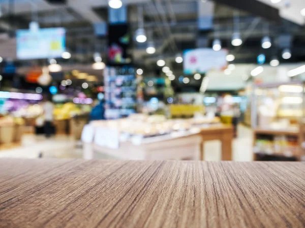 Esposizione del negozio al dettaglio del prodotto di sfondo del supermercato del banco del tavolo — Foto Stock