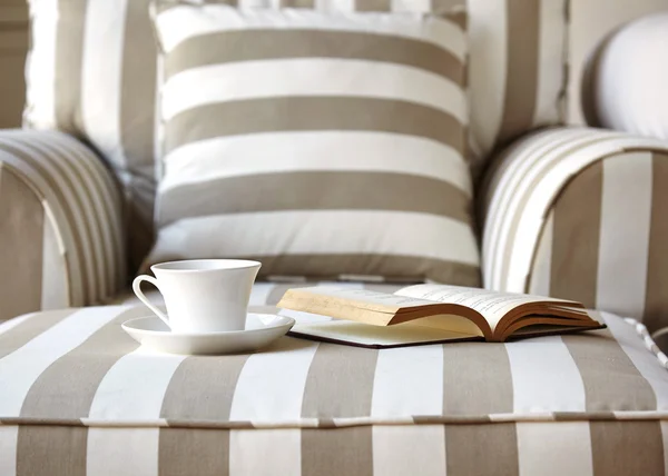 Living room sofa with coffee and book close up — Stock Photo, Image