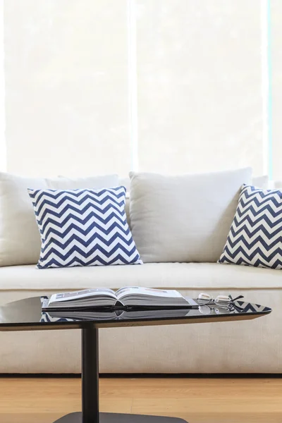 Living room sofa with pillow table and book — Stock Photo, Image