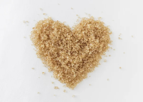 Bruine suiker in hart vorm — Stockfoto