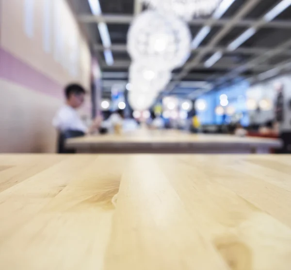 Top of Wooden table cafe shop interior Blurred background — Stock Photo, Image