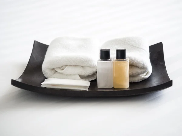 Mock up Spa Toiletry Shampoo and Soap with Hand Towel on wood tray — Stok Foto