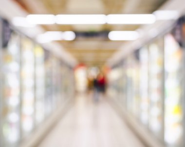 Süpermarket donmuş Dondurucu bölümünde perspektif bulanık arka plan olarak