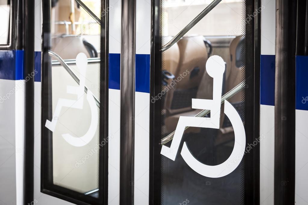 Handicap sign on bus door entrance