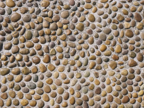 Kamenná dlažba kamenná zeď dekorace pozadí — Stock fotografie