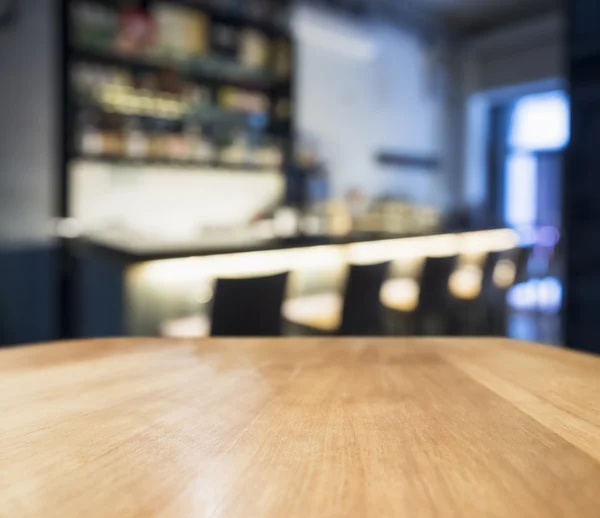 テーブル トップ カウンターぼやけたバー レストランの背景 — ストック写真