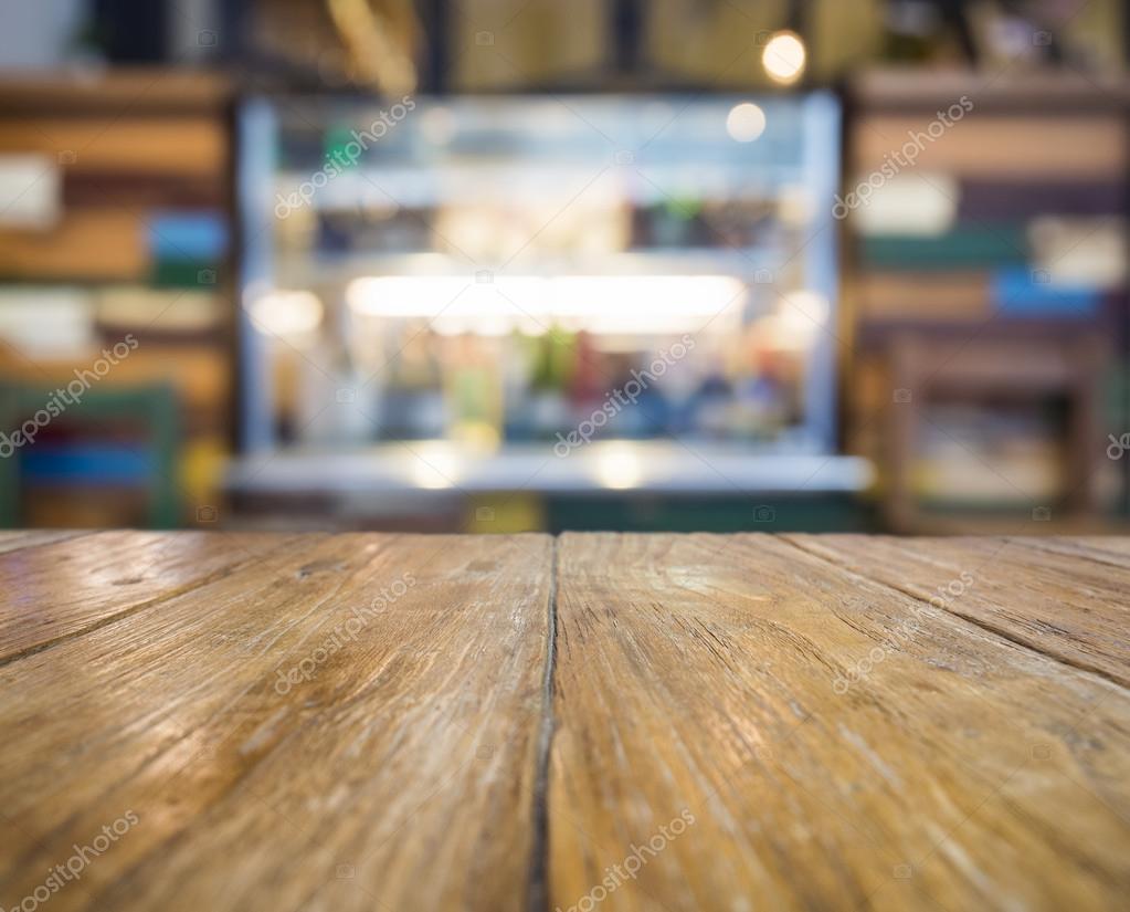Table top with bar counter Blurred restaurant background for Beverage  display Stock Photo by ©viteethumb 77623922