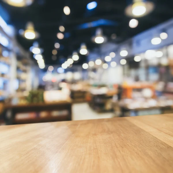 Barra de contador de mesa com fundo de loja de varejo desfocado — Fotografia de Stock