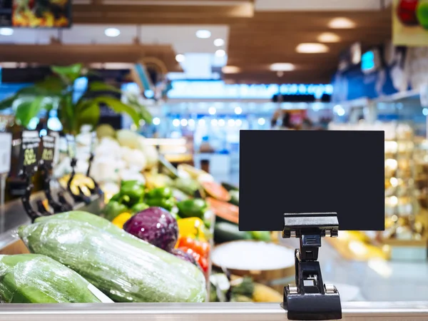 Mock up Exposição de sinal em branco no supermercado Fundo interior — Fotografia de Stock
