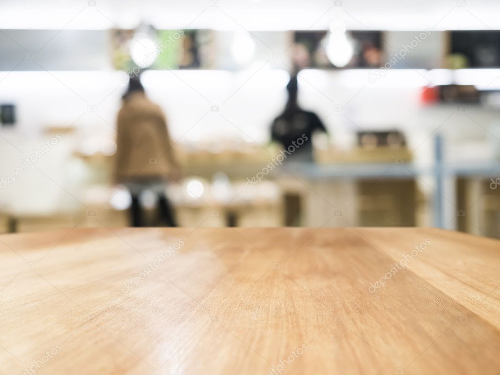 Table top with Blurred People Retail Shop interior background