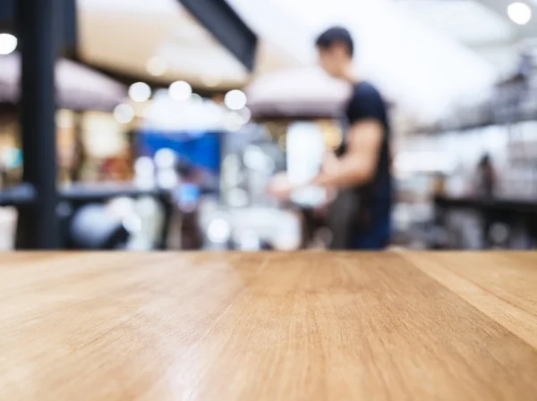 Tampo da mesa Contador com pessoas desfocadas em Cafe Shop — Fotografia de Stock