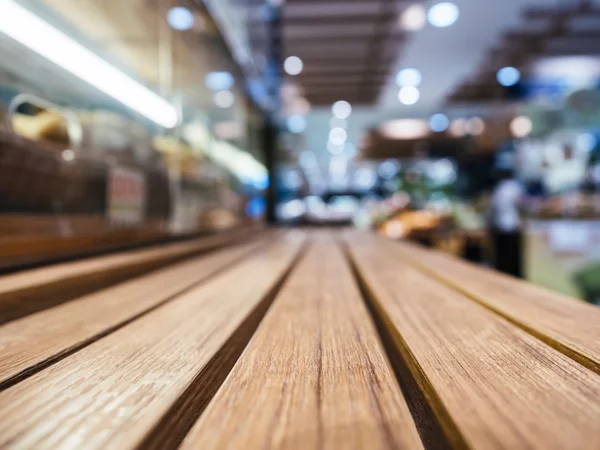 Piano tavolo con negozio Sfocato Retail Sfondo — Foto Stock