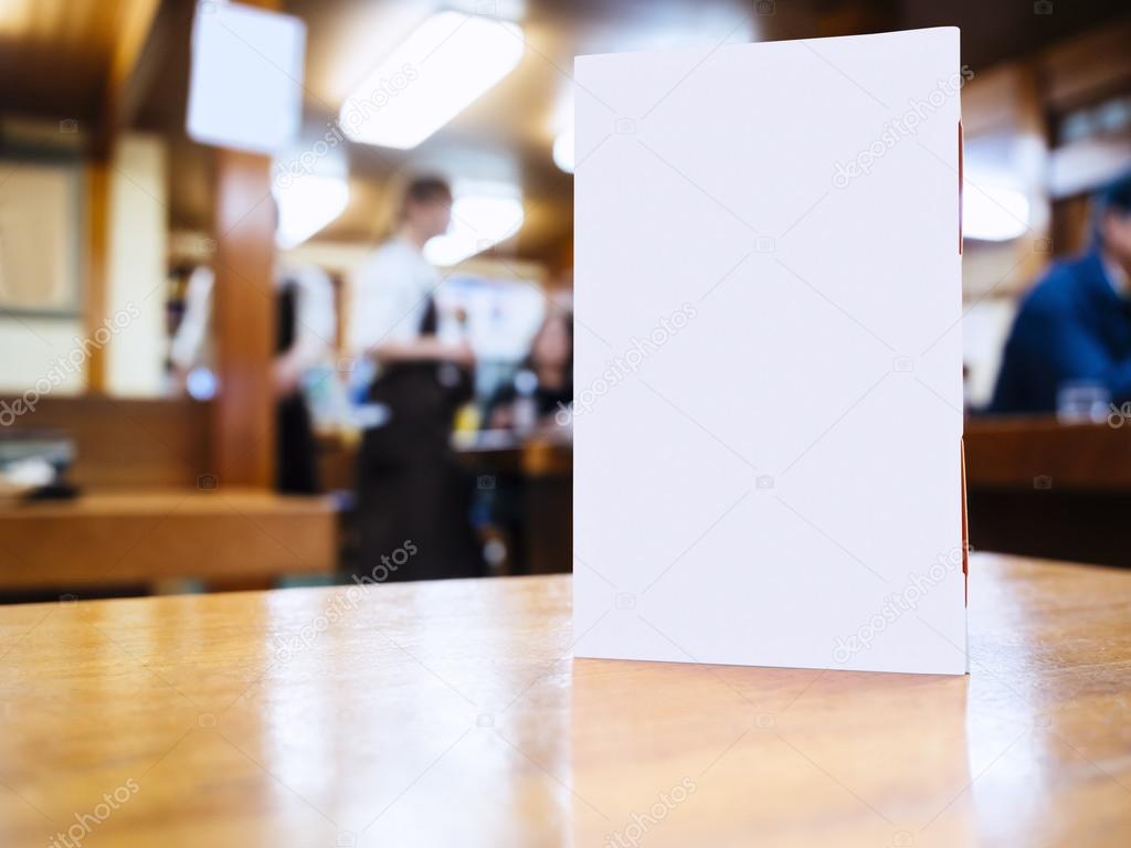 Mock up Menu frame on Table in Bar restaurant cafe Background