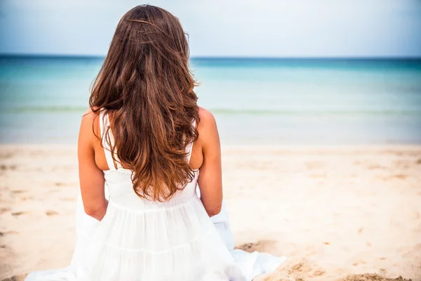 Girl in bikini on the background of the sea — Stock Photo, Image