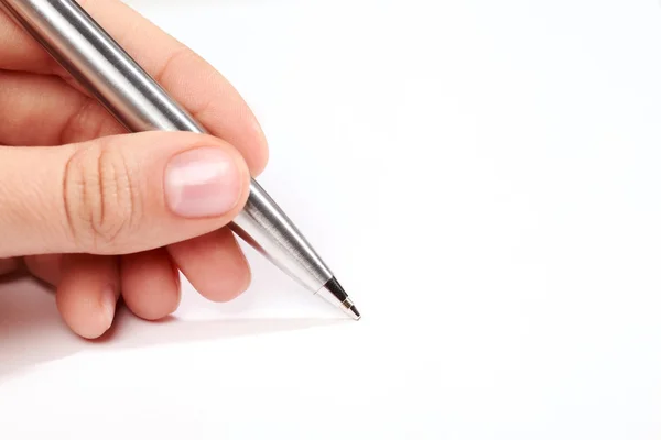 Pen in hand isolated — Stock Photo, Image