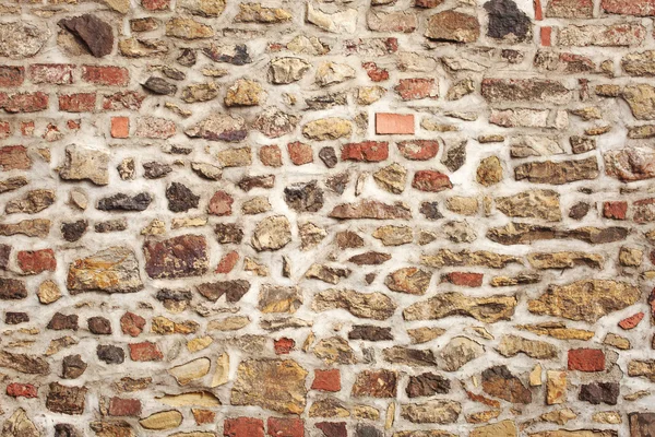 Oude middeleeuwse muur steen en baksteen — Stockfoto