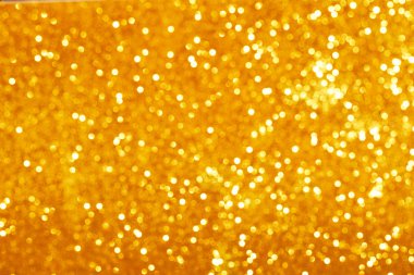 Altın glitter bokeh arka plan.