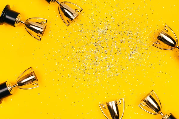 Golden Winner Cups Silver Sparkles Yellow Background Copy Space Festive — Stock Photo, Image